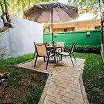 Apartamento com quintal na Praça do Pôr do Sol