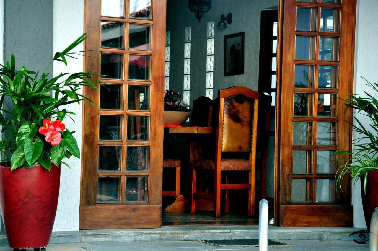 A Casa Que Hospeda Hospedagem domiciliar