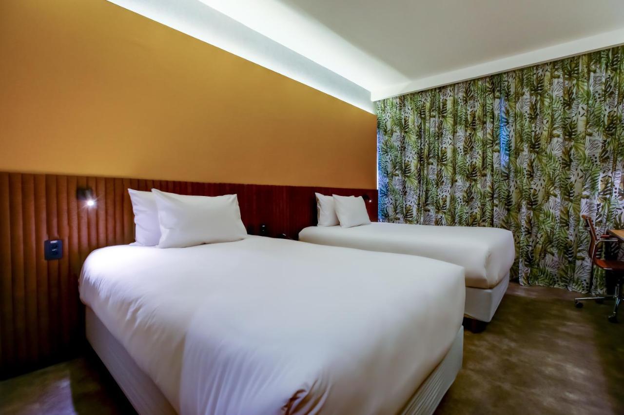 Hilton Garden Reboucas Hotel 4*
