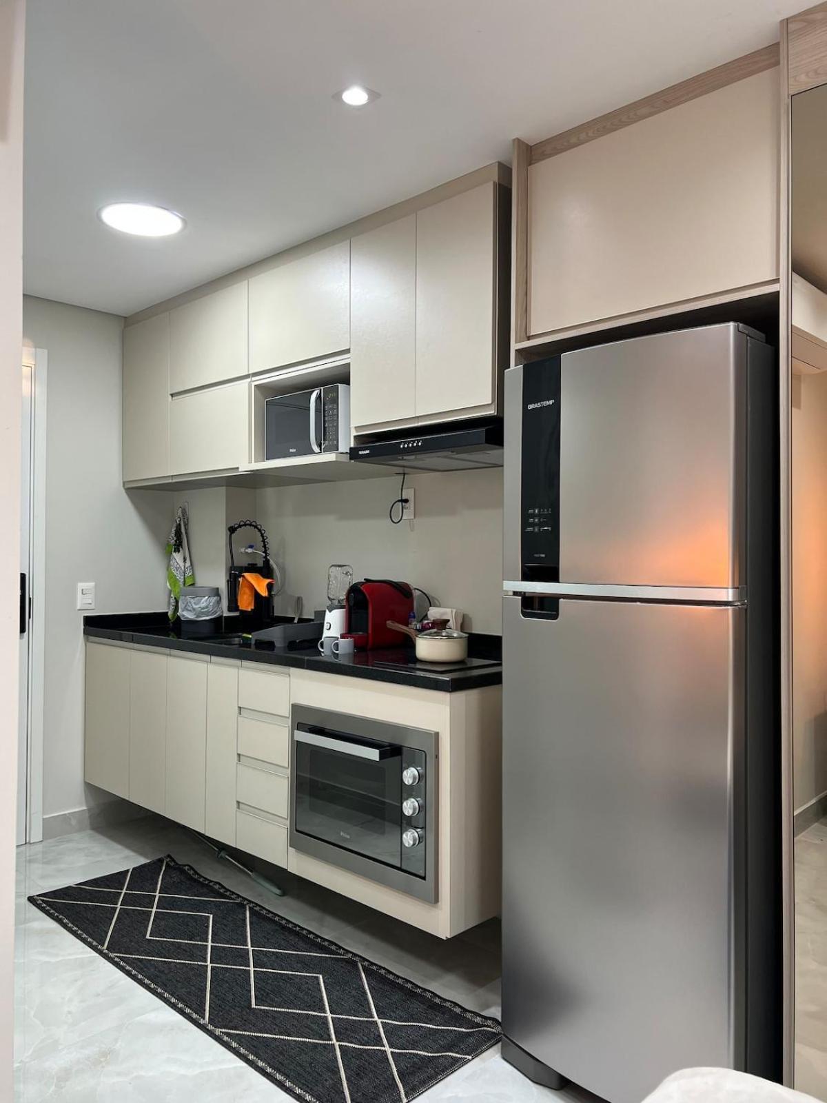 Vista 32 - Com Rooftop Apartment